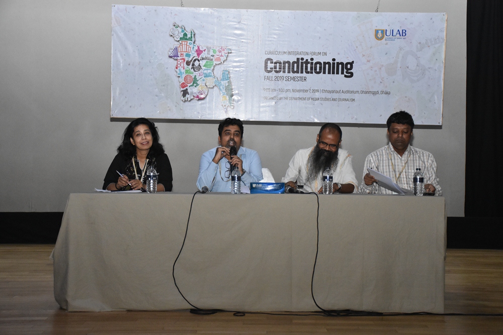 Photo 02: Panelists and the Moderator of the Public Dialogue